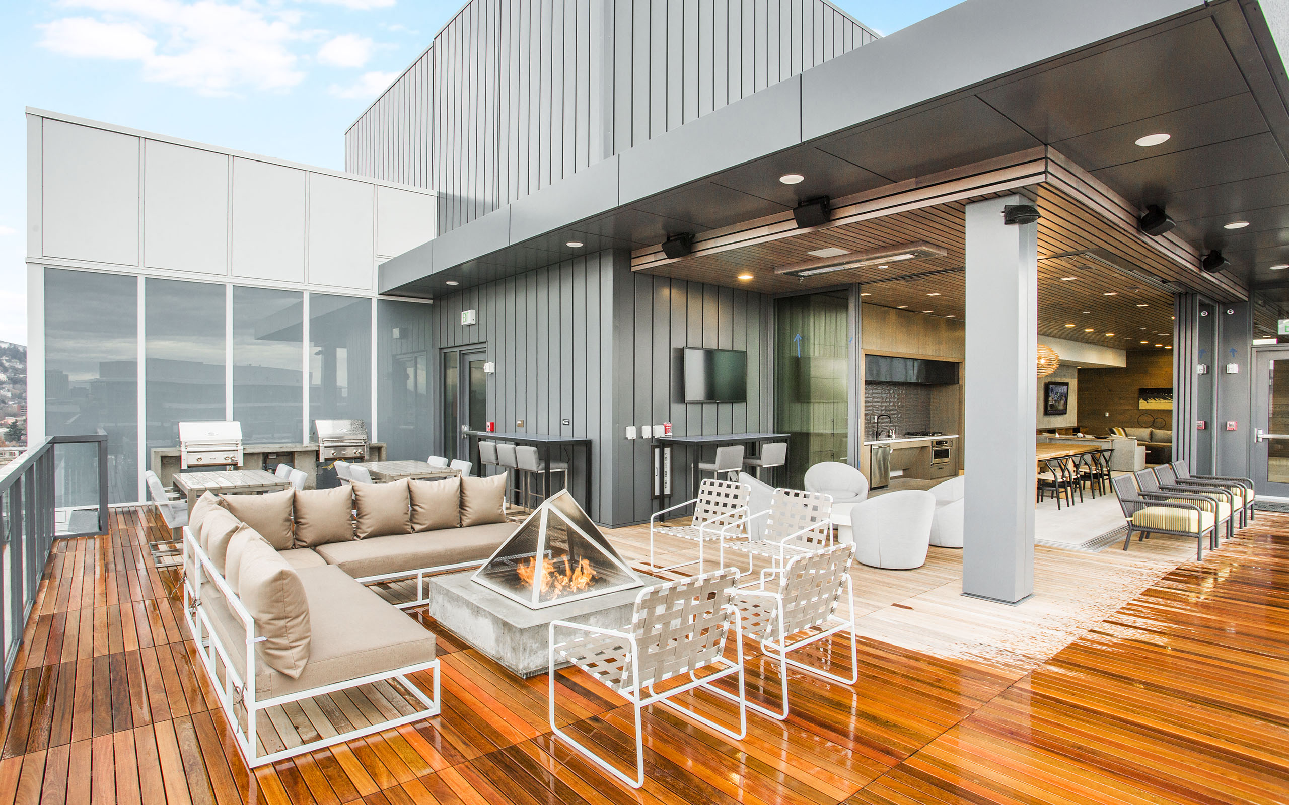 Block 17 Apartments Clubhouse Exterior Fireplace and Seating Area